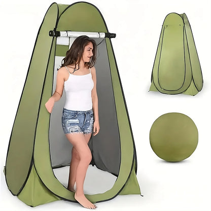 Pop-Up Privacy Tent, green fabric privacy enclosure by ViralGalleria.com with a person entering.
