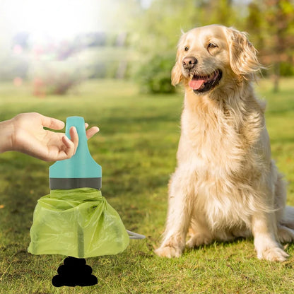 Portable dog poop scooper with teal handle and green bag, pictured beside a Golden Retriever on a sunny park lawn during a daily walk.