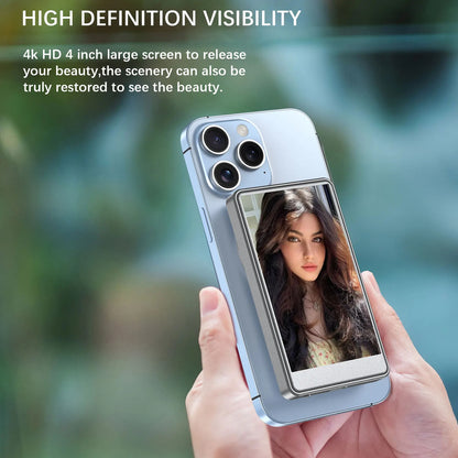 Vlog Selfie Monitor for iPhone attached to a blue iPhone with back-mounted screen displaying a portrait