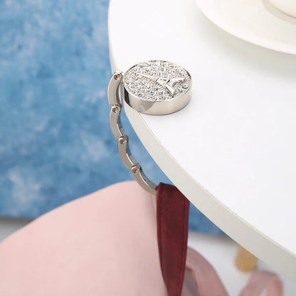 Gancho para Bolsos de Mesa