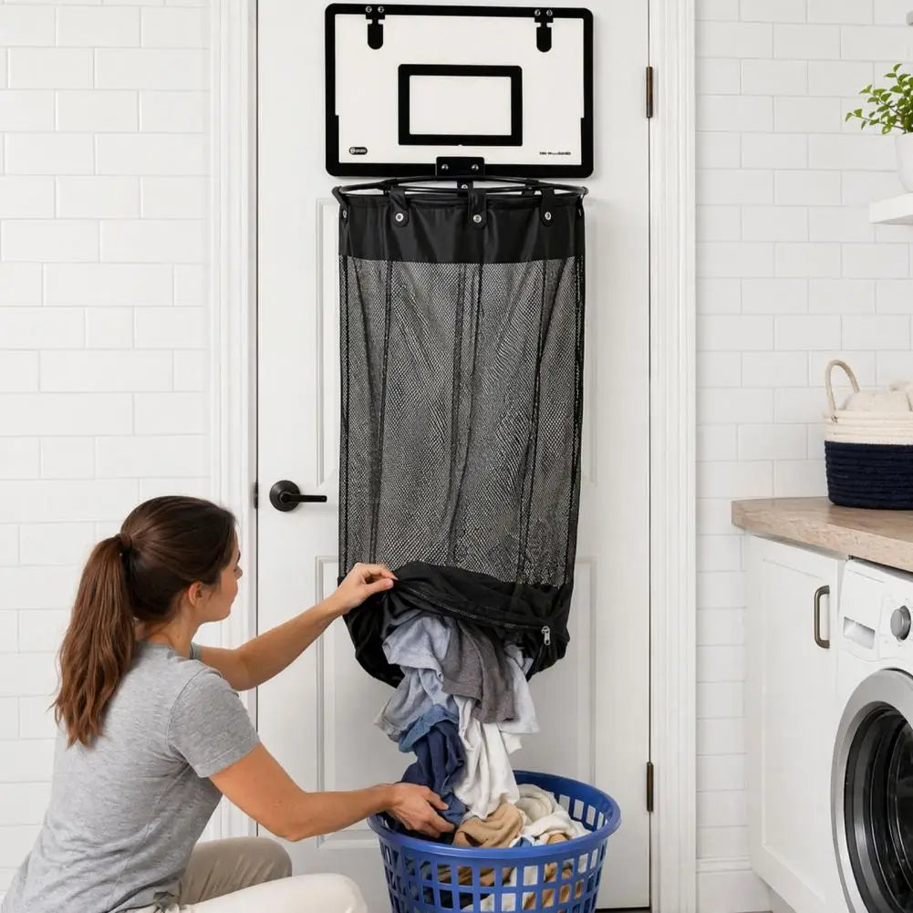 A woman kneels on the floor in a bright laundry room, pulling a black mesh laundry bag hanging from a wall-mounted basketball hoop. The laundry bag contains folded clothes, and a blue laundry basket sits below.
Wall-mounted basketball laundry basket in modern bathroom