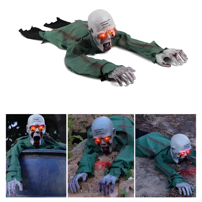 Sound-activated crawling zombie Halloween prop with glowing eyes on a white background. 
A creepy crawling zombie Halloween decoration shown in a large top view and three smaller bottom inset views demonstrating different poses. The zombie has a green tattered suit, gray skin, and glowing red eyes.