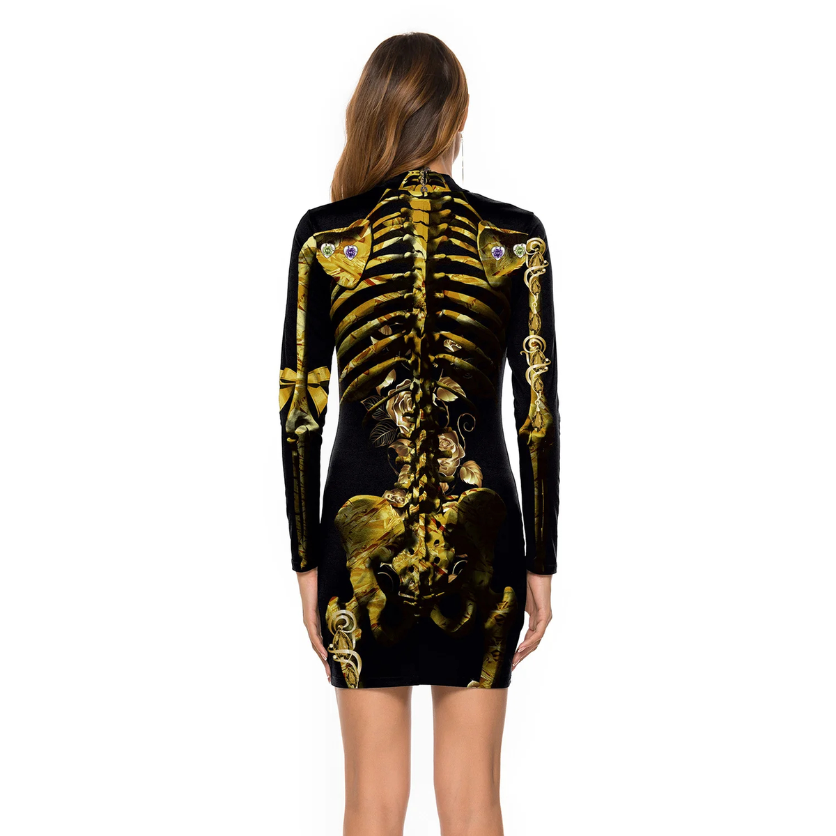 Back view of a black and gold skeleton long-sleeve Halloween mini dress. A woman viewed from the back wearing a fitted black long-sleeve mini dress with a large gold skeleton and ornate baroque-style graphic print across the back and sleeves.