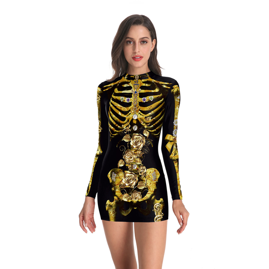 Woman wearing a black and gold skeleton long-sleeve Halloween mini dress, front view. 
Black dress with gold skeleton and floral design worn by a model on a white background